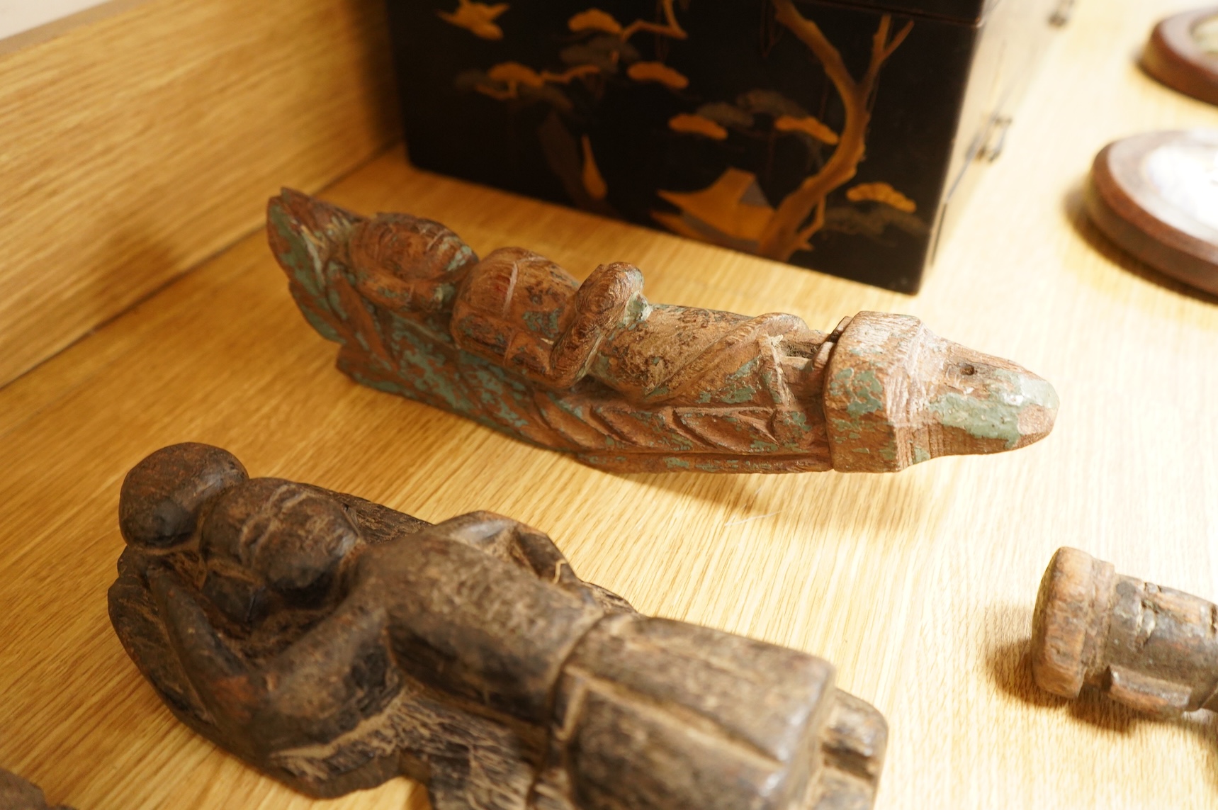 A group of Indian carved figures of deities, largest 42.5cm